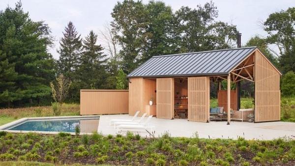 Pool House Inspired by a Horse Arena